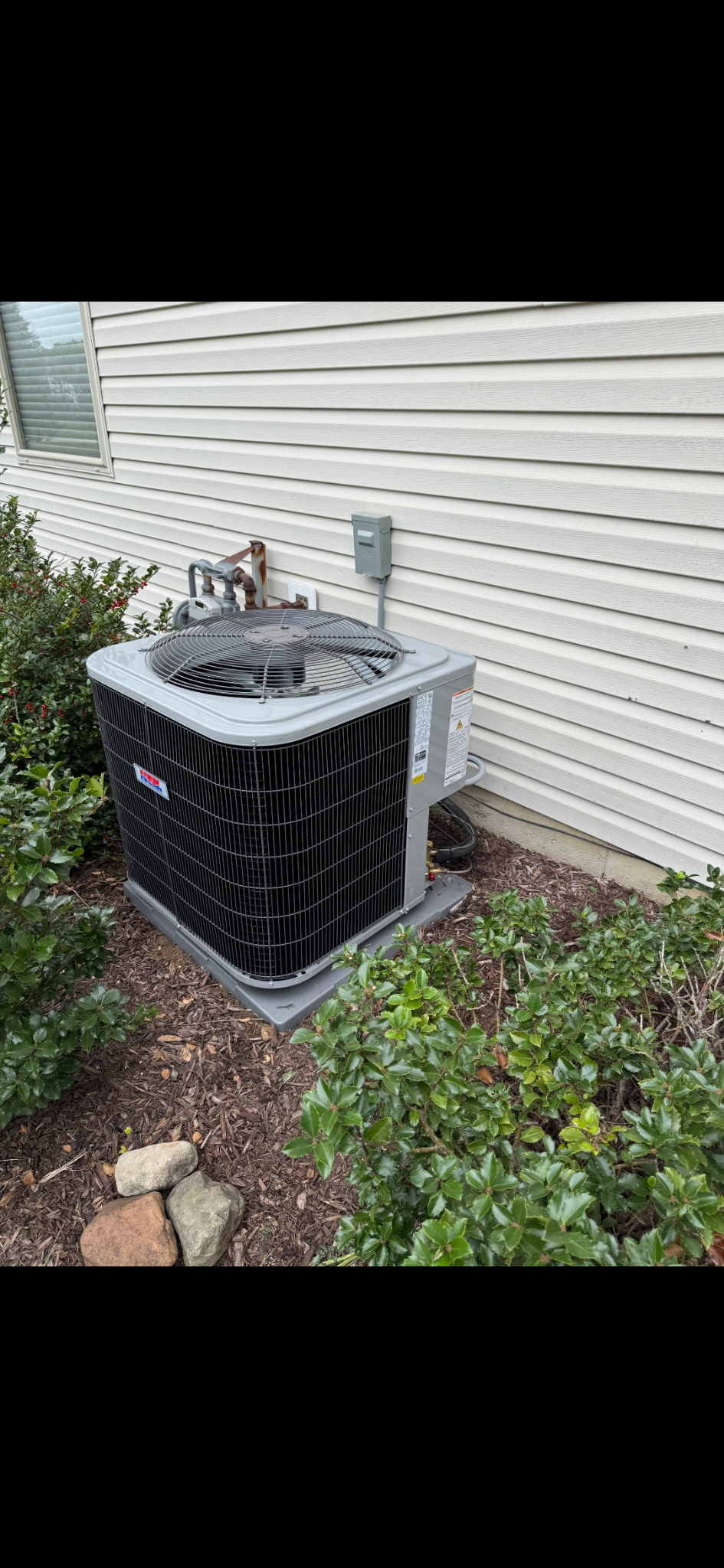 New residential air conditioner installed by Good Guys Home Services.