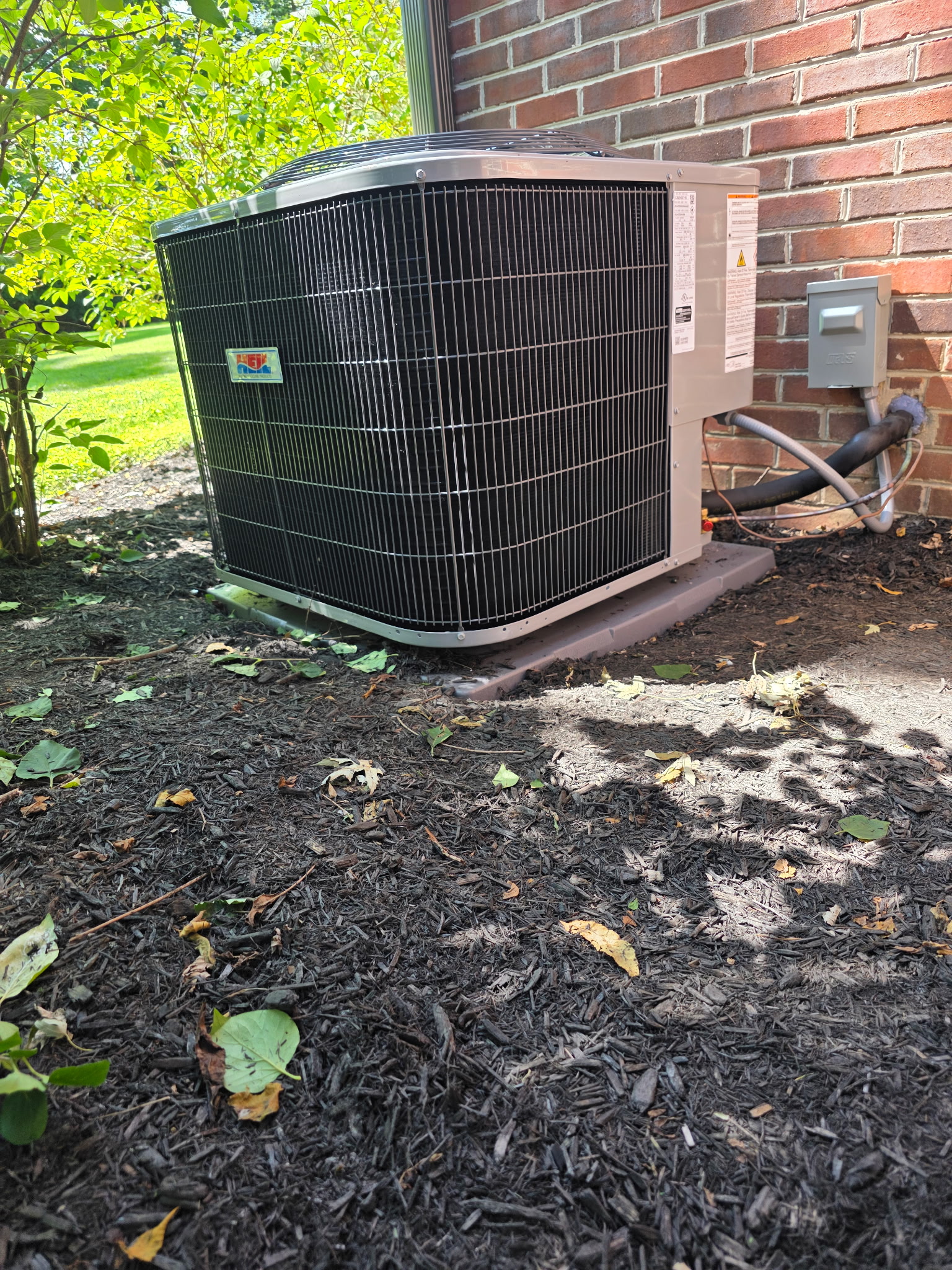 New residential air conditioner installed by Good Guys Home Services.
