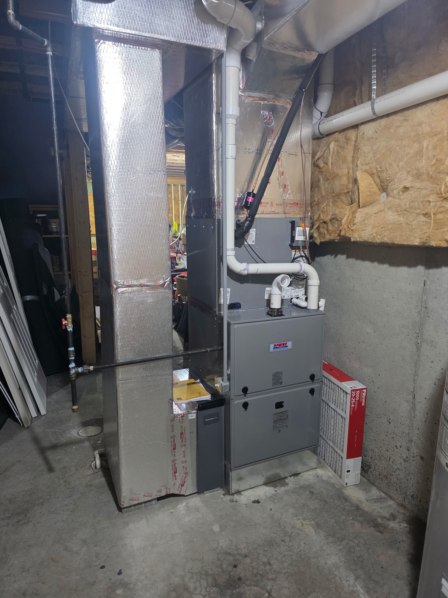 New residential air conditioner installed by Good Guys Home Services.