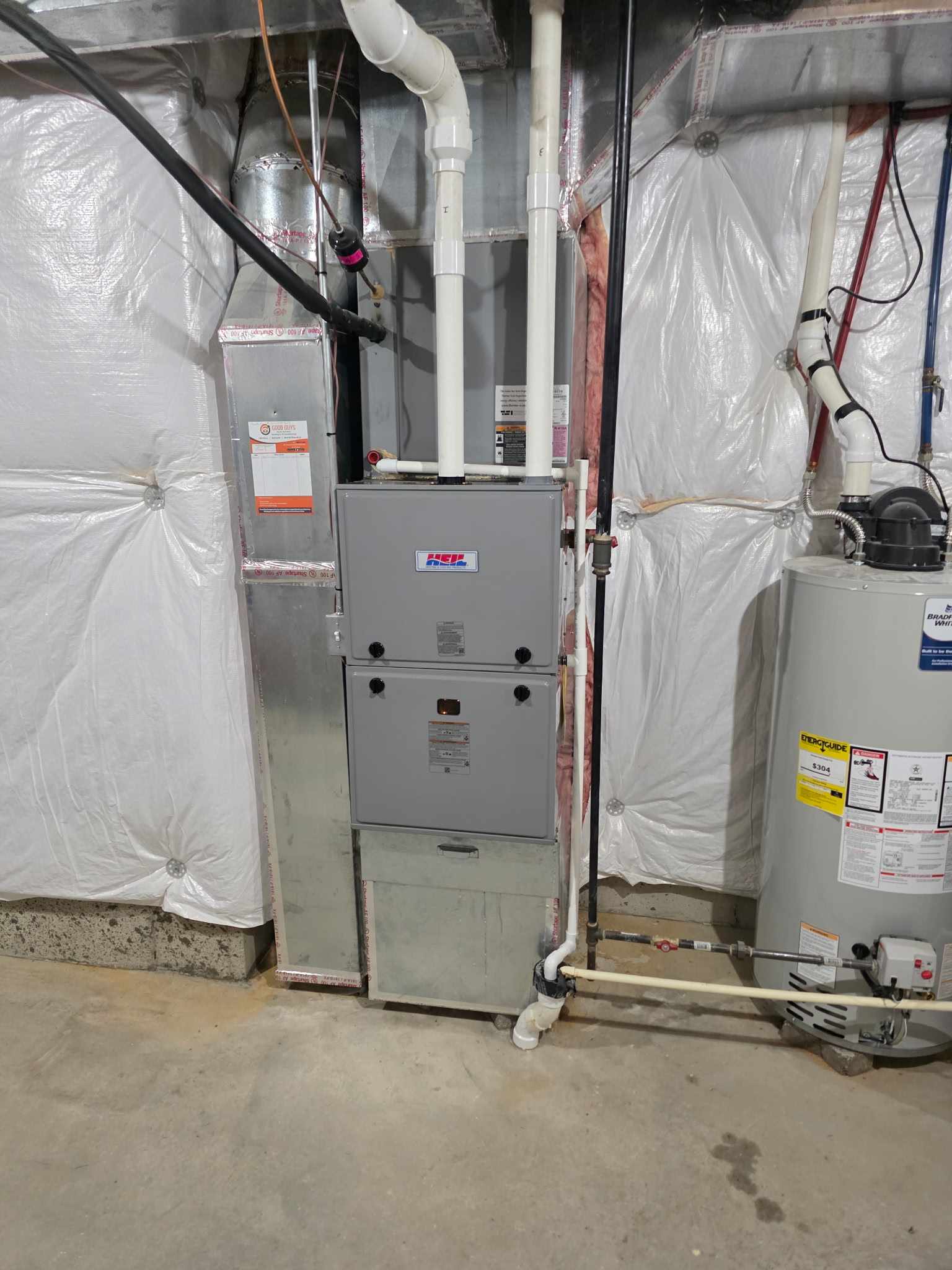 New residential air conditioner installed by Good Guys Home Services.